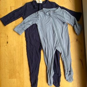 Kyte baby footed onsies. One navy blue and one sky blue.